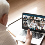 man talking with others on a video conference call